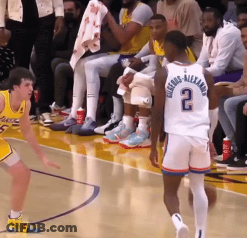 A Basketball Player With The Number 2 On His Jersey Stands On The Court GIF