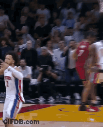 A Basketball Player With The Number 2 On His Jersey Stands On The Court GIF