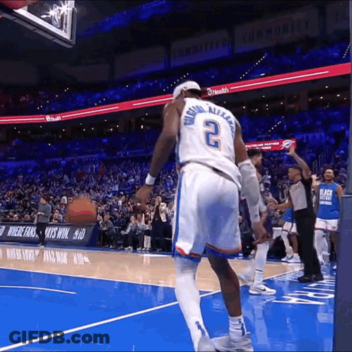 A Basketball Player With The Number 2 On The Back Of His Shirt GIF