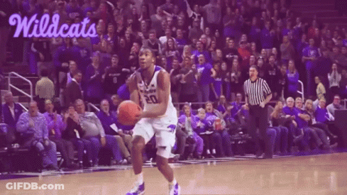 A Basketball Player With The Number 20 On His Jersey Is Dribbling The Ball GIF