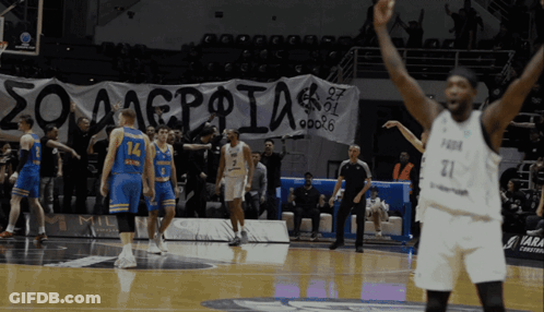 A Basketball Player With The Number 21 On His Jersey GIF