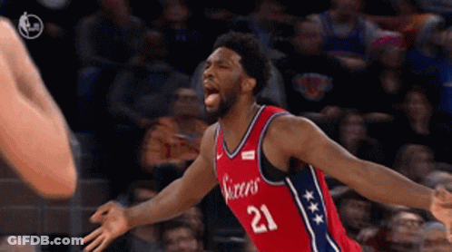 A Basketball Player With The Number 21 On His Shirt GIF