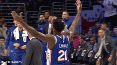 A Basketball Player With The Number 21 On The Back Of His Shirt GIF