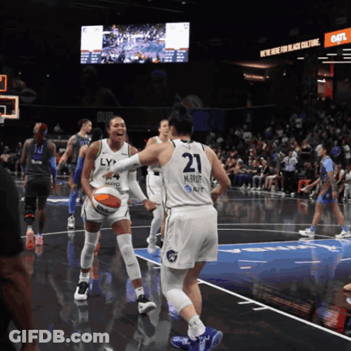 A Basketball Player With The Number 21 On Their Back GIF