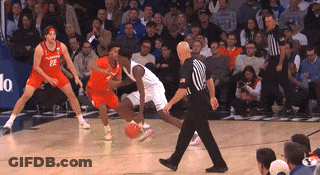 A Basketball Player With The Number 22 On His Jersey Is Dribbling The Ball GIF