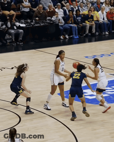 A Basketball Player With The Number 22 On The Back Of Her Shorts GIF