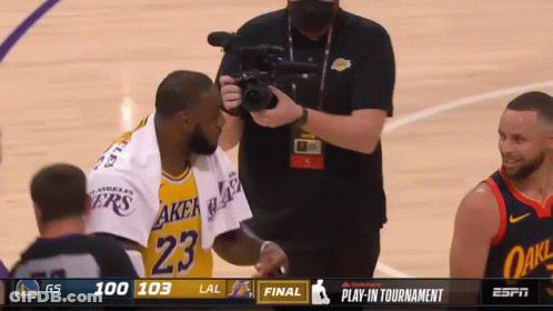 A Basketball Player With The Number 23 On His Jersey Is Being Filmed GIF