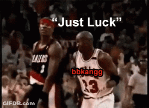 A Basketball Player With The Number 23 On His Jersey Is Running Towards Another Player GIF