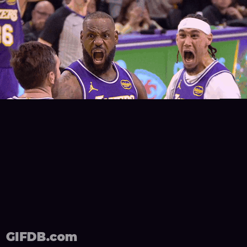 A Basketball Player With The Number 23 On His Jersey Screams GIF