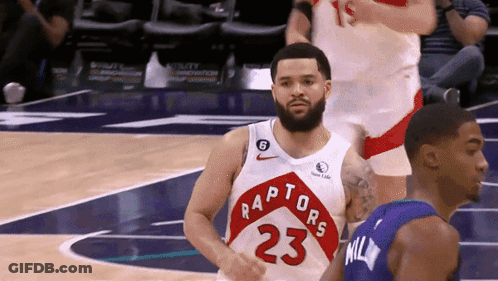 A Basketball Player With The Number 23 On His Jersey Stands On The Court GIF