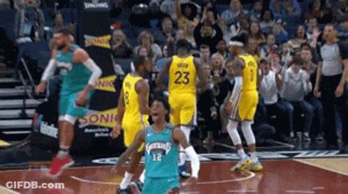 A Basketball Player With The Number 23 On The Back Of His Shirt GIF