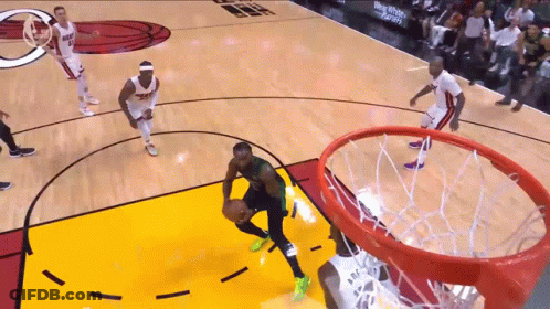 A Basketball Player With The Number 23 On The Back Of His Shirt GIF