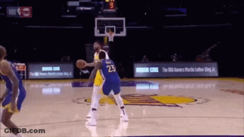 A Basketball Player With The Number 23 On The Back Of His Shorts GIF