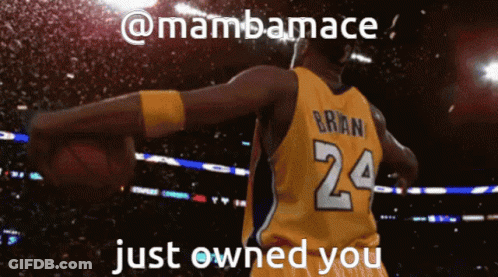 A Basketball Player With The Number 24 On His Jersey Is Holding A Basketball GIF