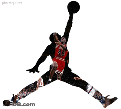 A Basketball Player With The Number 24 On His Jersey Is Holding A Basketball GIF