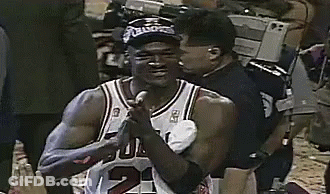 A Basketball Player With The Number 24 On His Jersey Is Holding A Microphone GIF