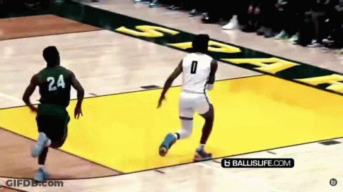 A Basketball Player With The Number 24 On His Jersey Is Running Towards Another Player With The Number 0 On His Jersey GIF