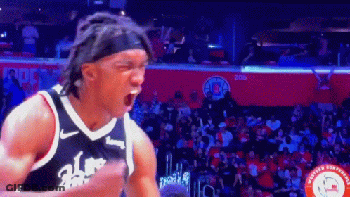 A Basketball Player With The Number 24 On His Jersey Is Screaming GIF