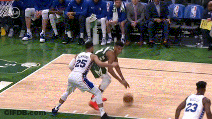 A Basketball Player With The Number 25 On His Back Dribbles The Ball GIF