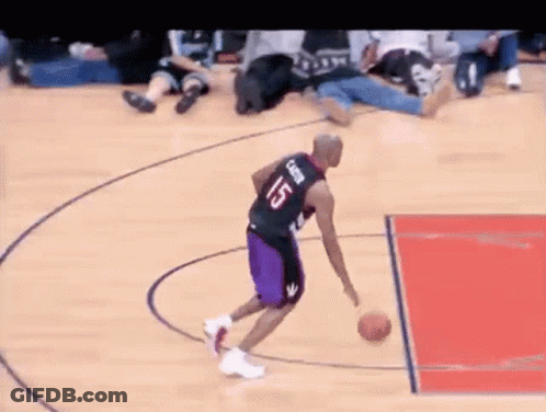 A Basketball Player With The Number 25 On His Jersey Is Dribbling A Basketball On A Basketball Court . GIF