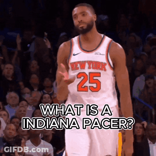 A Basketball Player With The Number 25 On His Jersey Stands In Front Of A Crowd GIF