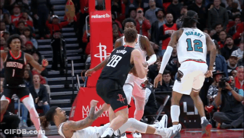 A Basketball Player With The Number 28 On The Back Of His Shirt GIF