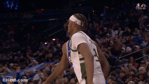 A Basketball Player With The Number 3 On His Back GIF