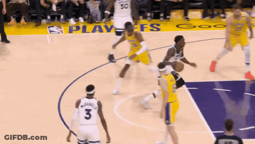 A Basketball Player With The Number 3 On His Jersey Is Dribbling The Ball GIF