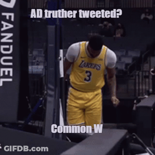 A Basketball Player With The Number 3 On His Jersey Stands In A Locker Room GIF
