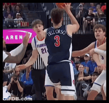 A Basketball Player With The Number 3 On His Jersey Throws The Ball GIF