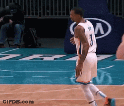A Basketball Player With The Number 3 On His Jersey Walks On The Court GIF