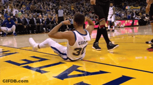 A Basketball Player With The Number 30 On His Jersey Lays On The Floor GIF