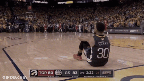 A Basketball Player With The Number 30 On His Jersey Sits On The Floor GIF