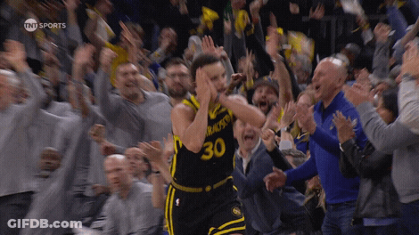 A Basketball Player With The Number 30 On His Jersey Stands In Front Of A Crowd GIF