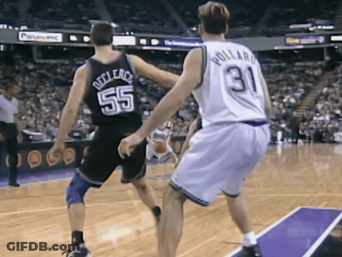 A Basketball Player With The Number 31 On His Back Is Playing Against A Player With The Number 55 On His Back GIF