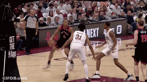 A Basketball Player With The Number 31 On His Jersey Dribbles The Ball GIF