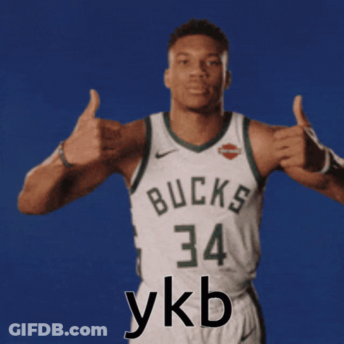 A Basketball Player With The Number 34 On His Jersey Gives Two Thumbs Up GIF