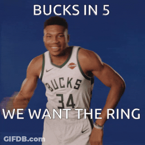 A Basketball Player With The Number 34 On His Jersey Is Dancing GIF