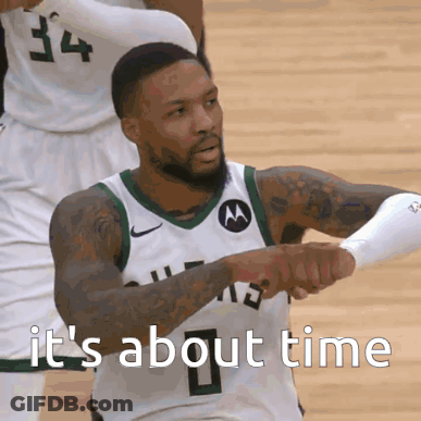 A Basketball Player With The Number 34 On His Jersey Is Giving A Fist Bump GIF