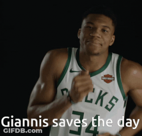 A Basketball Player With The Number 34 On His Jersey Is Smiling GIF