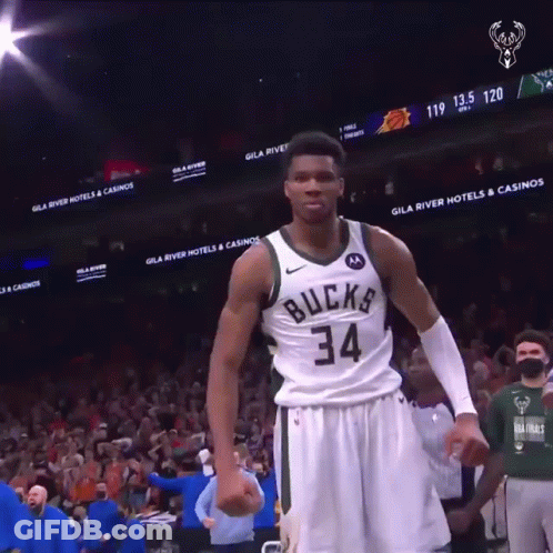 A Basketball Player With The Number 34 On His Jersey Stands On The Court GIF