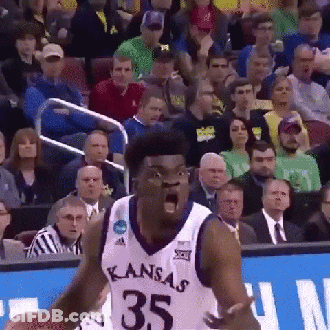 A Basketball Player With The Number 35 On His Jersey Is Screaming In Front Of A Crowd GIF