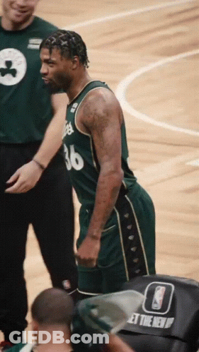 A Basketball Player With The Number 36 On His Jersey Stands On The Court GIF