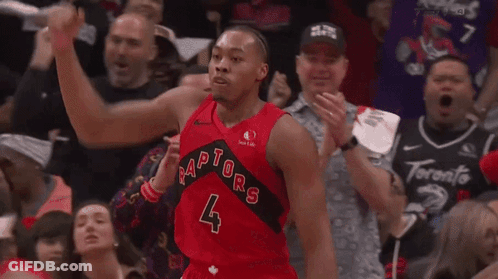 A Basketball Player With The Number 4 On His Jersey Is Celebrating GIF