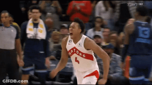 A Basketball Player With The Number 4 On His Jersey Is Celebrating GIF