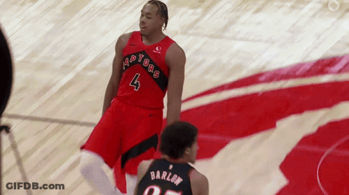 A Basketball Player With The Number 4 On His Jersey Is Standing Next To Another Player GIF