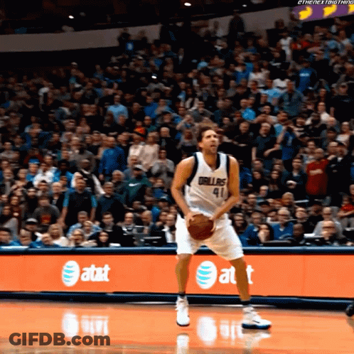 A Basketball Player With The Number 41 On His Jersey Stands On The Court GIF