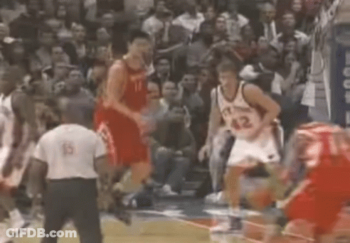 A Basketball Player With The Number 42 On His Back Jumps In The Air GIF