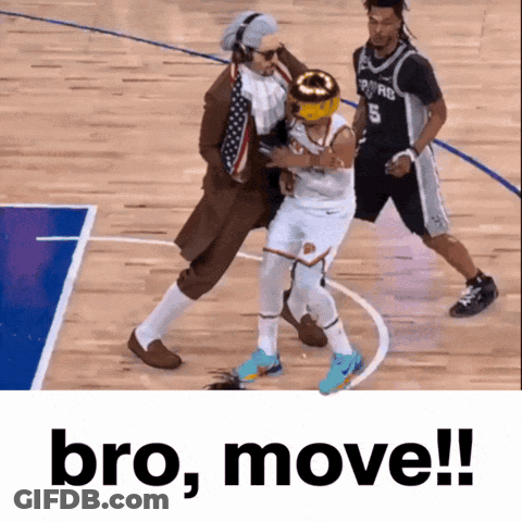 A Basketball Player With The Number 5 On His Jersey Is Being Fouled By A Man In A Suit GIF