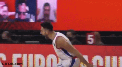A Basketball Player With The Number 5 On His Jersey Is Jumping GIF